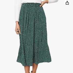 Green and white polka dot midi skirt